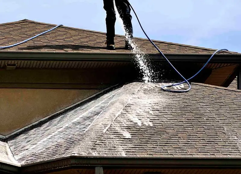 wcdfw3 Roof being pressure washed in Dallas-Fort Worth